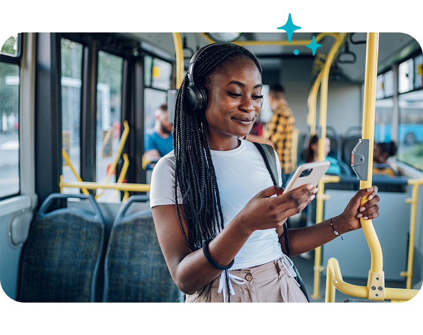 Black Lady with Phone on Bus